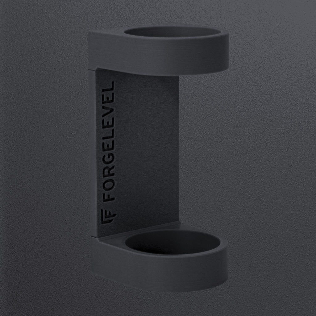 Produktbild Schalldämpferhalter L in Schwarz, mit dunklem Hintergrund